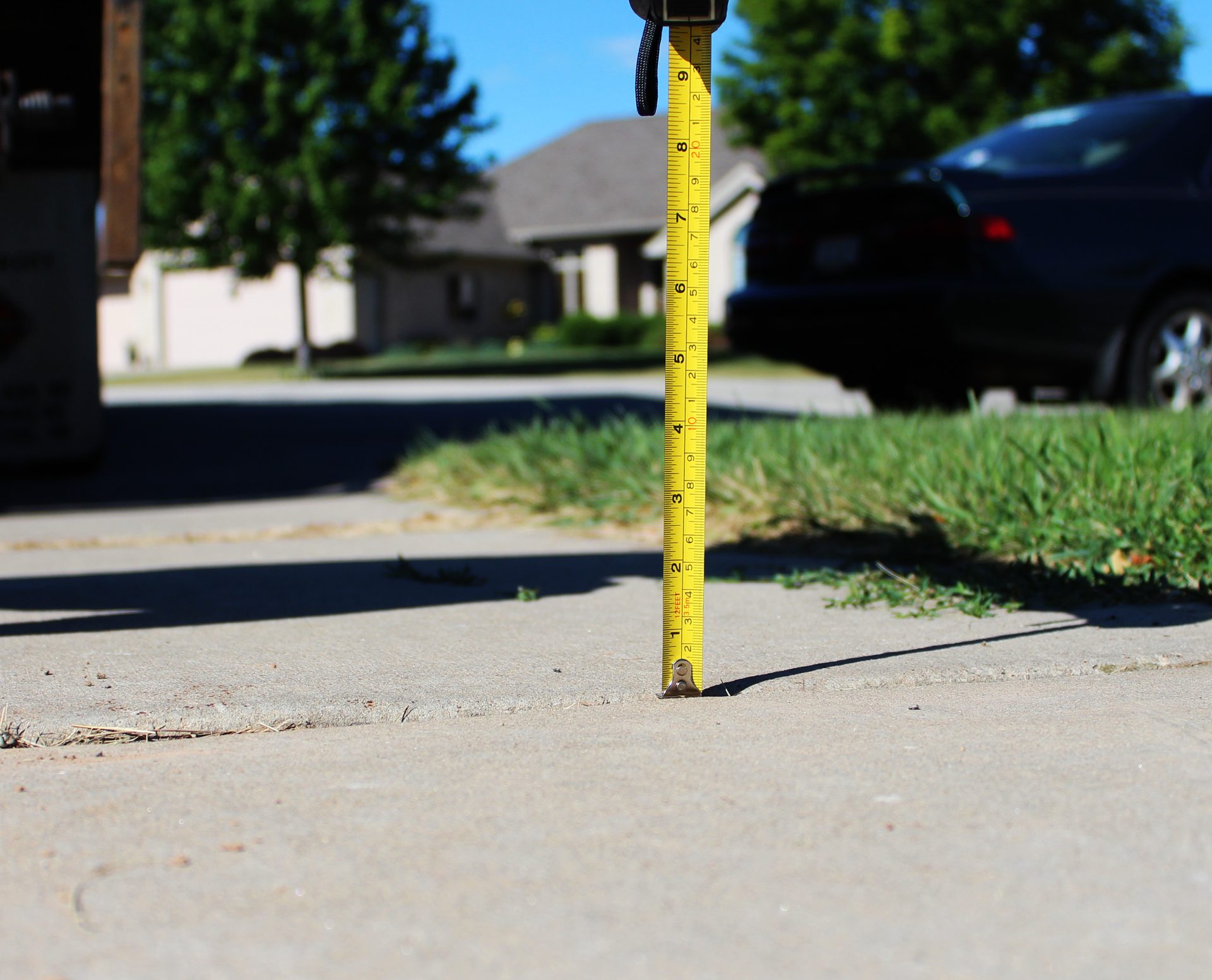 Driveway apron lifted and level after foam concrete lifting Utah County